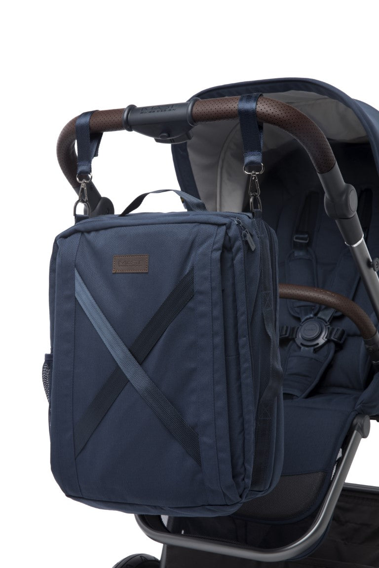 a blue bag on a stroller