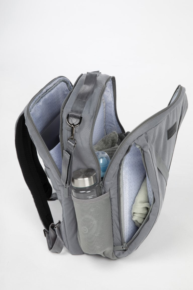 a grey backpack with a bottle and baby stuff inside
