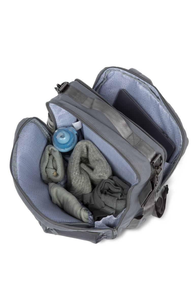 a bag with clothes and a bottle